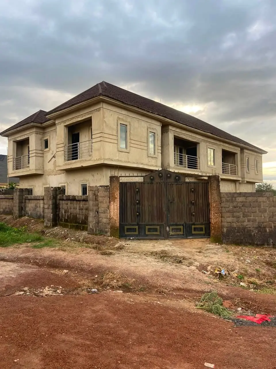 Completed structure with perimeter wall and gate